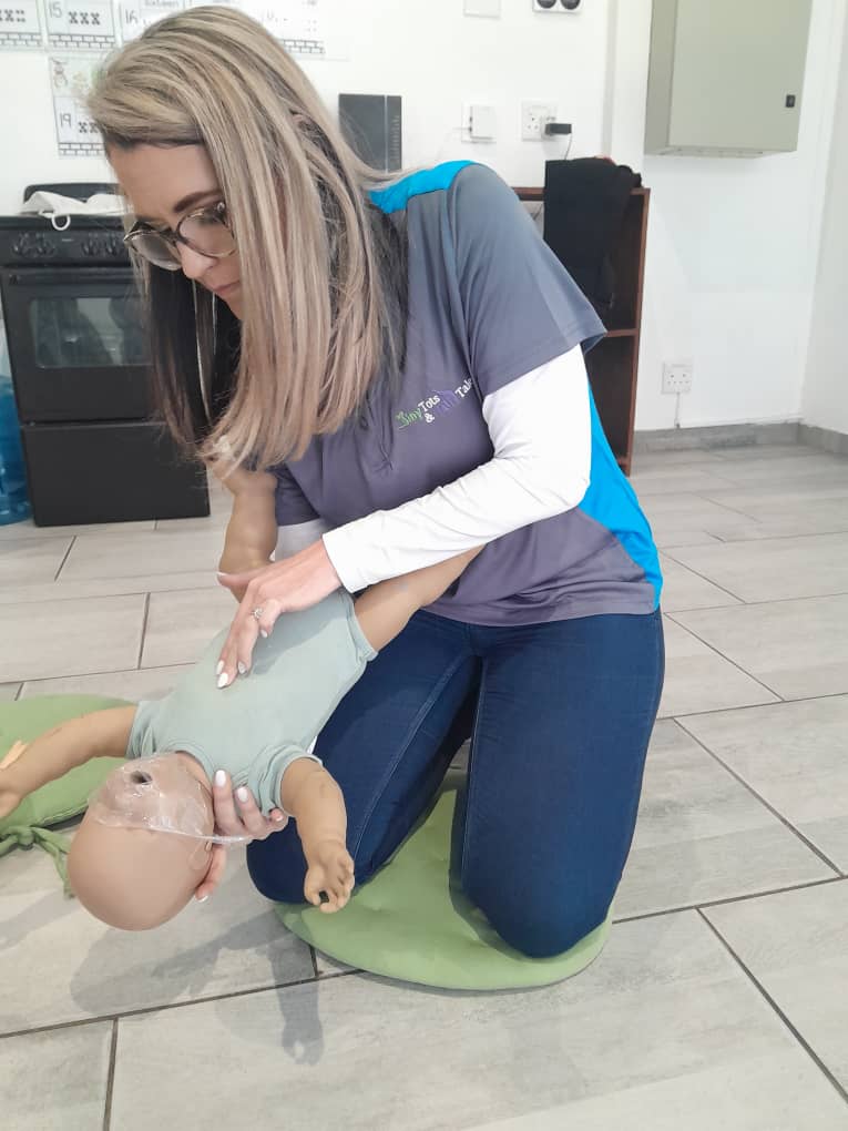 CPR demonstration on baby